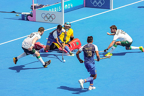 Vivek Sagar Prasad dribbles during match between India and Ireland